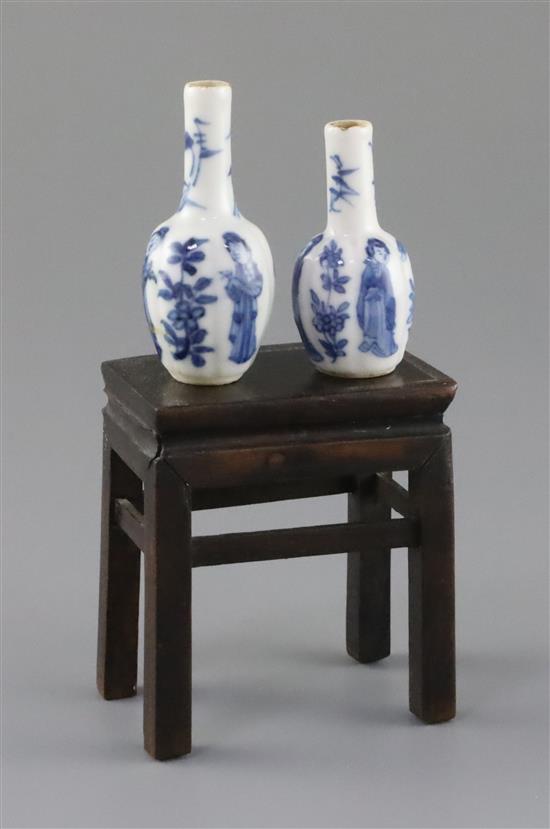 Two similar Chinese blue and white lobed miniature bottle vases, Kangxi period,